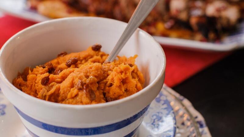 Spicy sweet potatoes with sultanas. Photograph: Emma Jervis