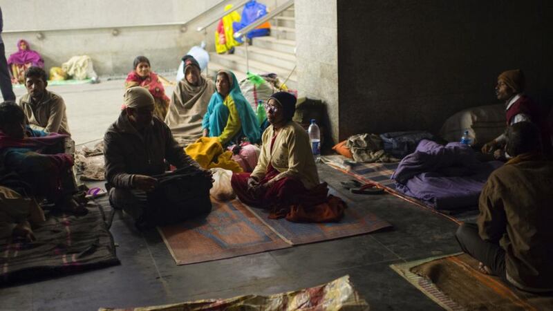 Ranno Trivedi, a breast cancer patient, rests at the metro station near her hospital while waiting for a blood test in New Delhi earlier this month. Photograph: Lynsey Addario/New York Times