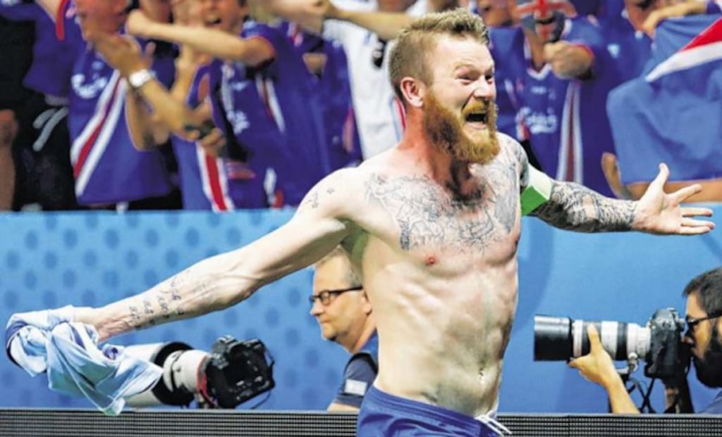 Aron Gunnarsson celebrates after Iceland – the smallest nation to ever reach a major tournament – inflicted a shock 2-1 win over England at the Stade de Nice that led manager Roy Hodgson to step down after his team’s exit from the competition. Match reports: Sports Tuesday. PHOTOGRAPH: MICHAEL DALDER/REUTERS