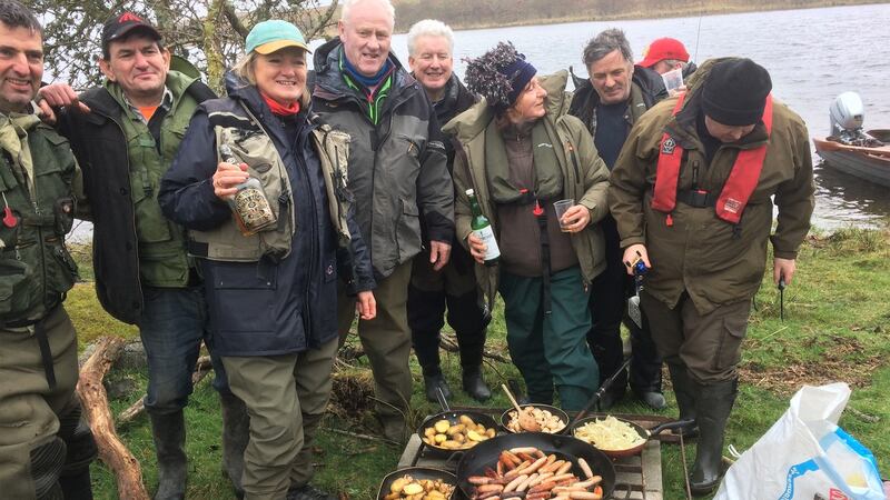Cornamona anglers enjoying a BBQ on the Corrib on the trout angling season’s opening day.