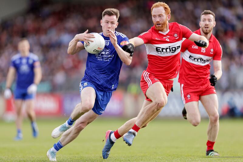 Monaghan's Karl O Connell and Conor Glass of Derry contest the ball during the Ulster SFC semi-final on Saturday. Photograph: Laszlo Geczo/Inpho