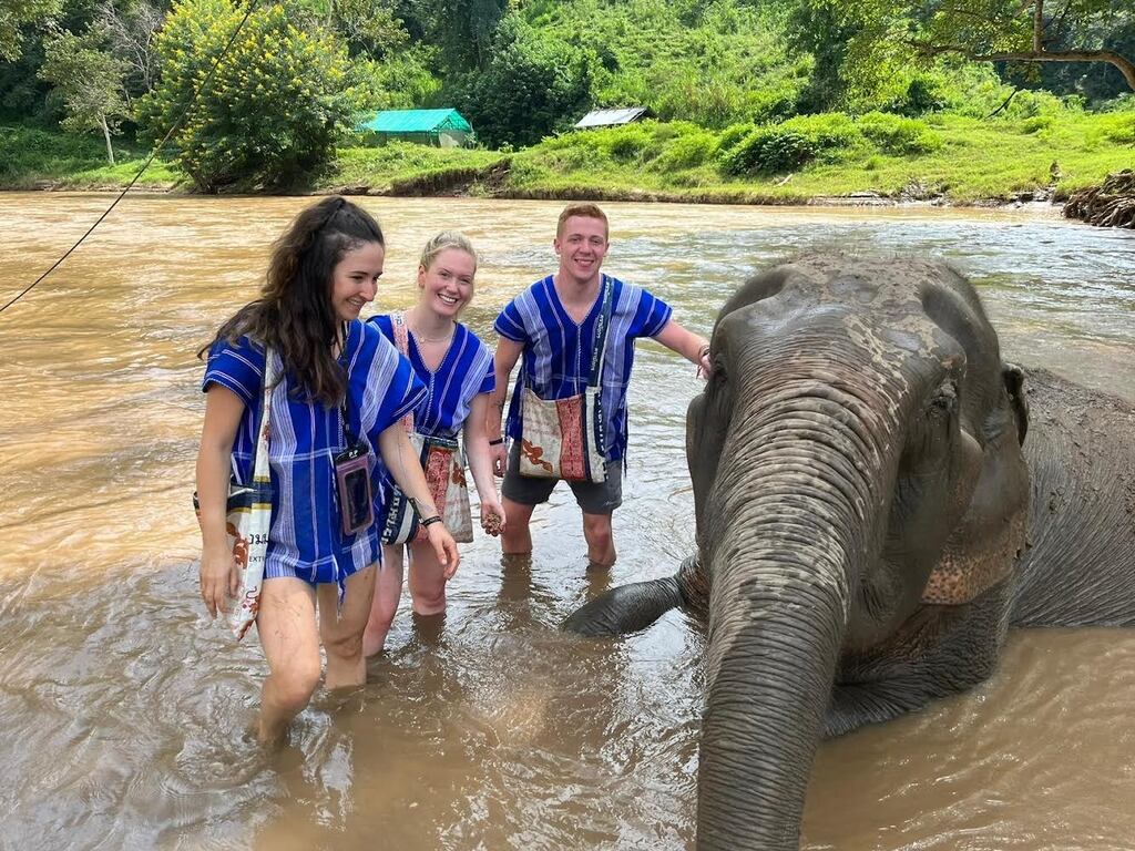Aisling Geraghty (left) with friends at an elephant sanctuary near Chiang Mai in northern Thailand.