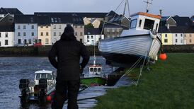 Coastal towns at risk of further flooding as wind warning issued