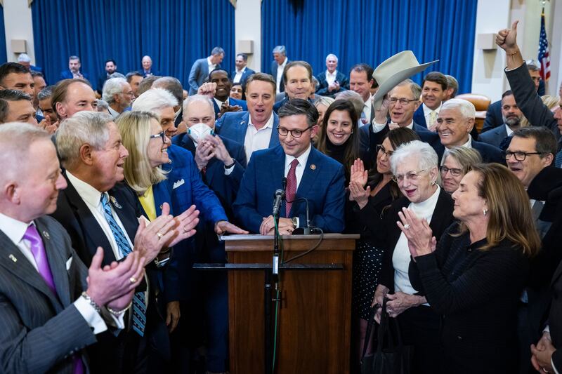 Mike Johnson is surrounded by fellow Republicans after they voted him as their next speaker nominee. Photograph: Jim Lo Scalzo/EPA