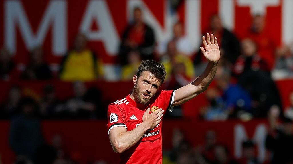Michael Carrick leaves the pitch after his final appearance for Manchester United. Photograph: Martin Rickett/PA