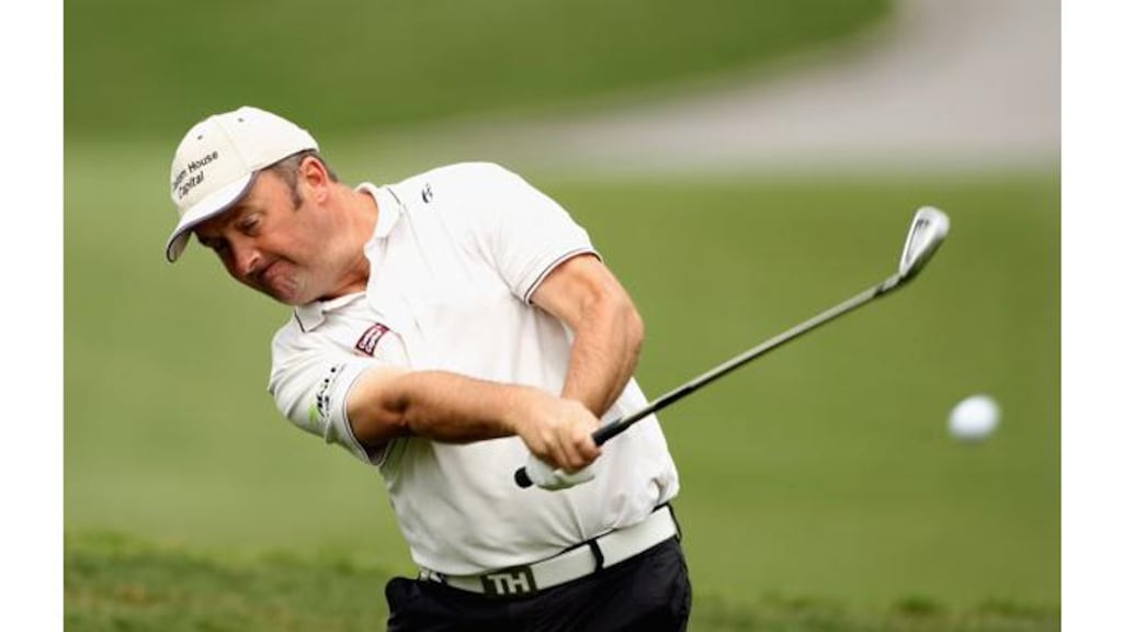 Damien McGrane in action during the opening round of the Ballantine’s Championship at Blackstone Golf Club in Icheon, South Korea. – (Andrew Redington/Getty Images).