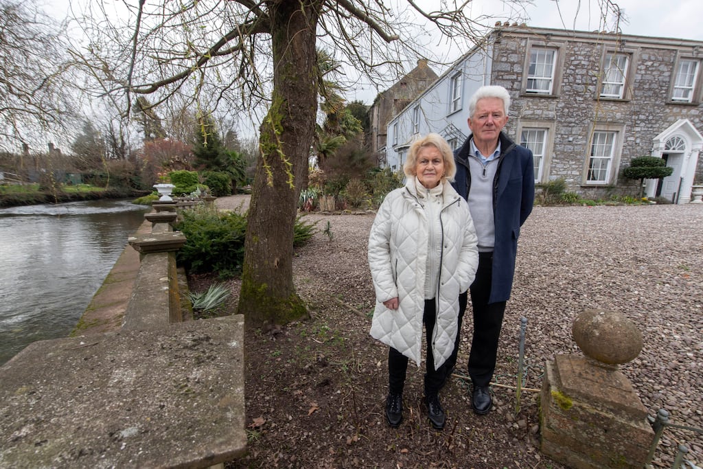 Noreen and Liam Motherway outside their house in Midleton which was badly affected by flooding in Storm Babet. Photograph: Michael Mac Sweeney/Provision