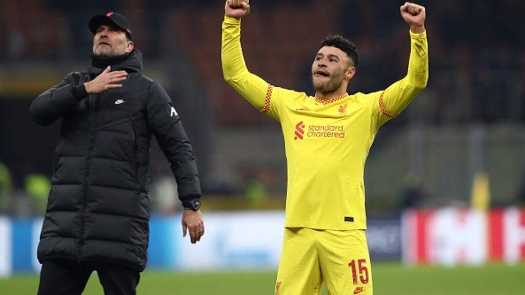 Jürgen Klopp and Alex Oxlade-Chamberlain celebrate victory at the San Siro. Photograph: Marco Luzzani/Getty Images