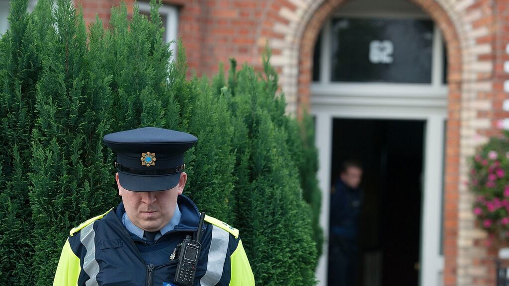 A file image showing a garda outside the house on South Circular Road where 25-year-old DJ Leo Carolan died. Photograph: Dave Meehan/The Irish Times