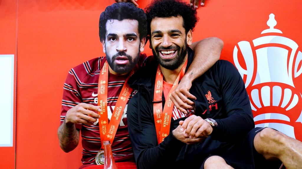 Liverpool’s Thiago Alcântara  wears a Mohamed Salah mask as he celebrates with Mohamed Salah after winning the FA Cup final at Wembley Stadium on Sunday. Photograph: Adam Davy/PA Wire