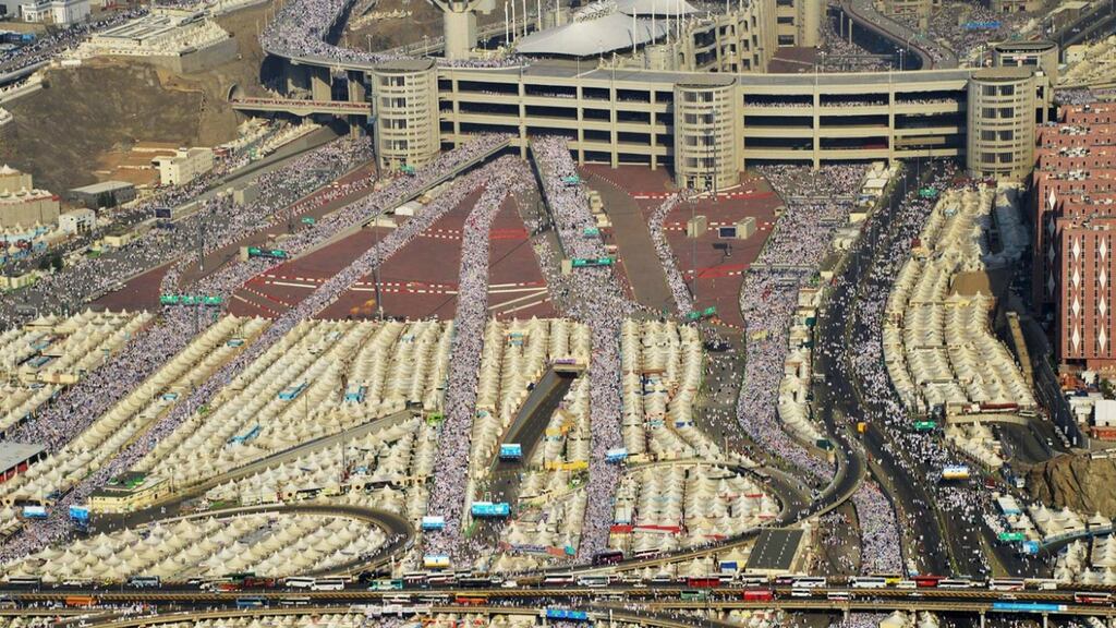 Hundreds of thousands of Muslim pilgrims make their way to cast stones at a pillar in Mina on the outskirts of the holy city of Mecca yesterday. Photograph: Saudi Press Agency/AP
