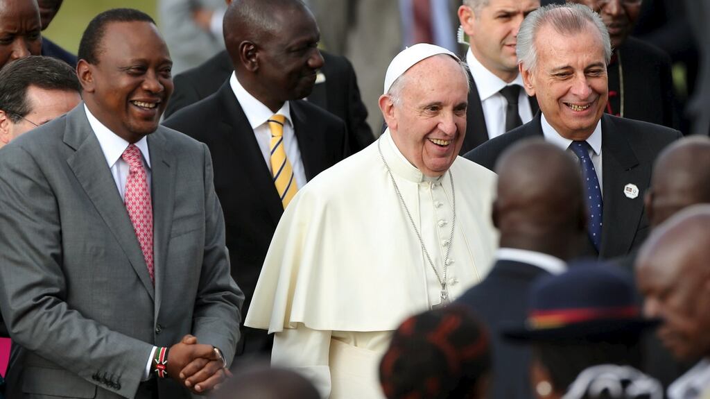 Pope Francis smiles with Kenyan president Uhuru Kenyatta in Nairobi, Kenya. Photograph: Goran Tomasevic/Reuters