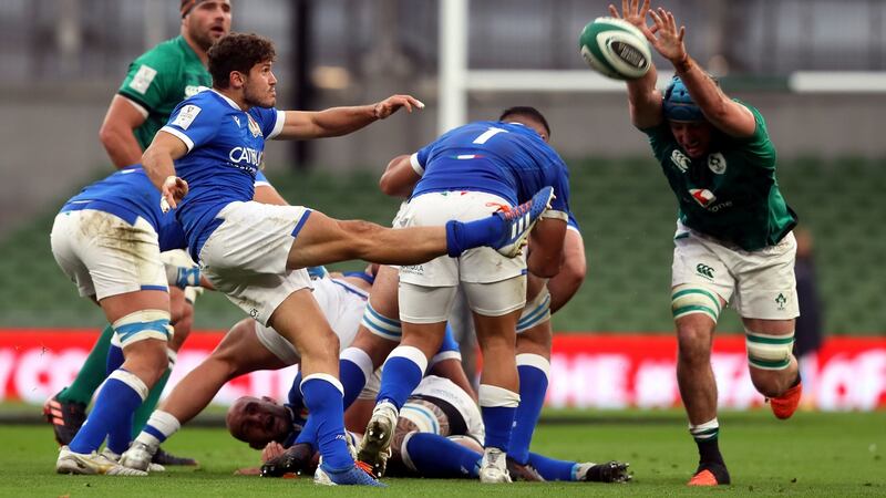Will Connors blocks down a kick from Marcello Violi. Photo: Brian Lawless/PA Wire