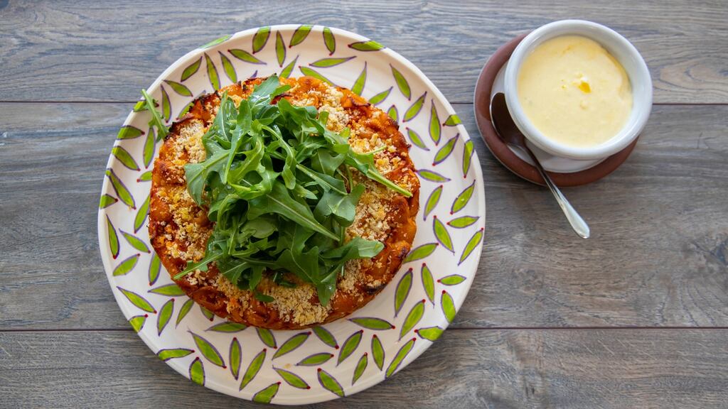 Baked pasta cake with rocket and Parmesan cream. Photograph: Patrick Browne