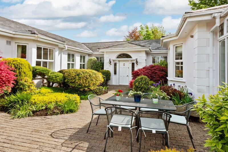 The Orchard was built in 1990 in the style of a Regency-era villa.