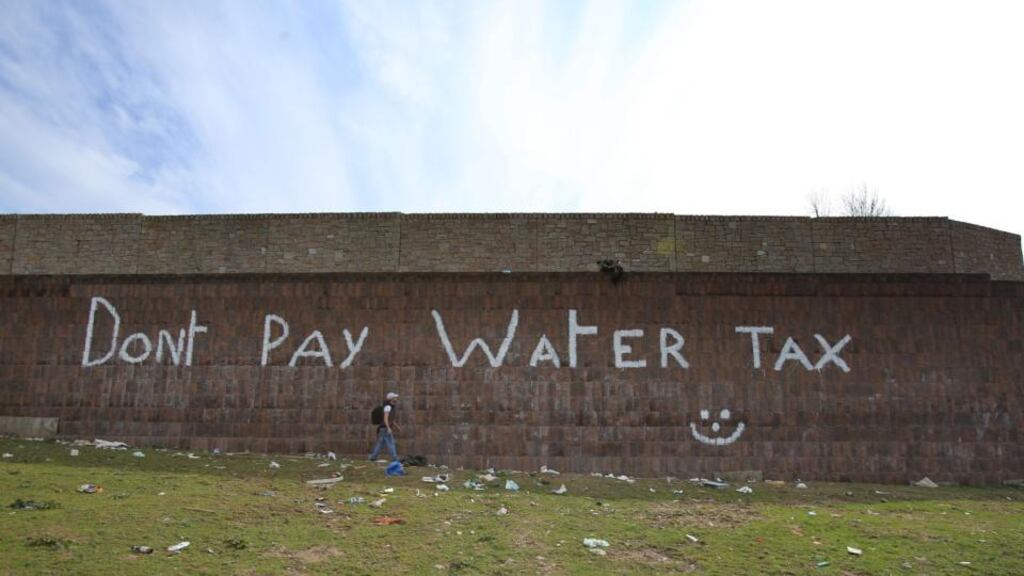 Anti-water charges graffiti in Dublin. The Government has still not agreed on the measures to be taken against people who do not pay their water bills. Photograph: Niall Carson/PA Wire.