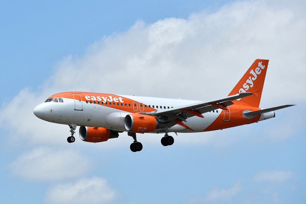An EasyJet aircraft lands at El Prat airport in Barcelona, Spain. The airline was profitable during the busy July to September quarter, when it flew 26.3m seats, 88% of 2019′s schedule before the pandemic hit. Photograph: Pau Barrena/AFP via Getty Images