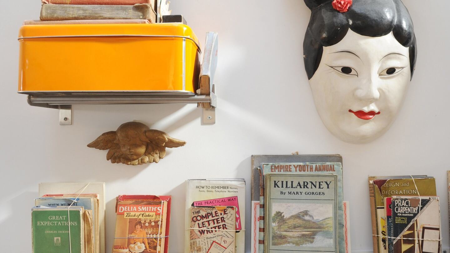 Retro: books and bric-a-brac in Janie Lazar’s cottage in Glasthule, Co Dublin. Photograph: Aidan Crawley