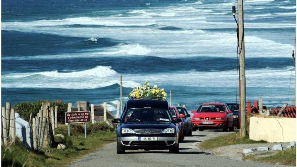 The funeral cortege of John Gaughan (72), who died in suspicious
circumstances at the weekend, passes his home in Glosh, Co Mayo,
overlooking the Atlantic. Fr Michael Harrison told mourners, who
filled the church to overflowing, that he had been a Good
Samaritan.
