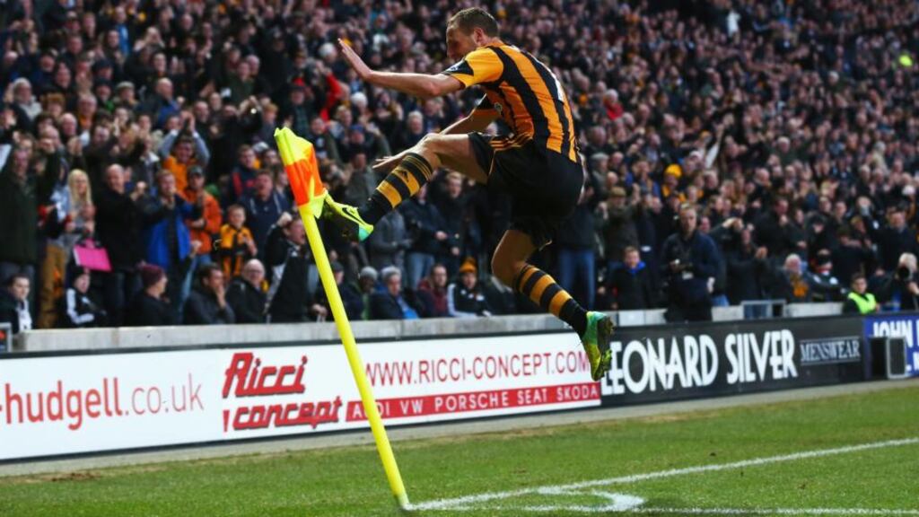 David Meyler of Hull City celebrates scoring his team’s second goal during the Premier League match against Liverpool at KC Stadium. Photograph: Matthew Lewis/Getty Images