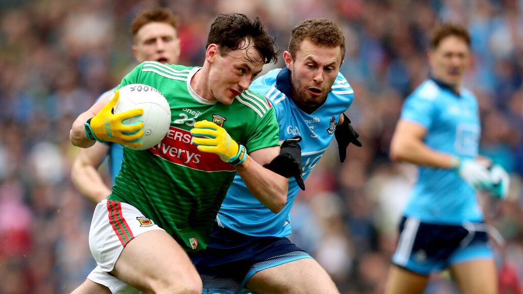 Diarmuid O’Connor in action for Mayo against Jack McCaffrey during the All-Ireland semi-final.  Photograph: Ryan Byrne/Inpho