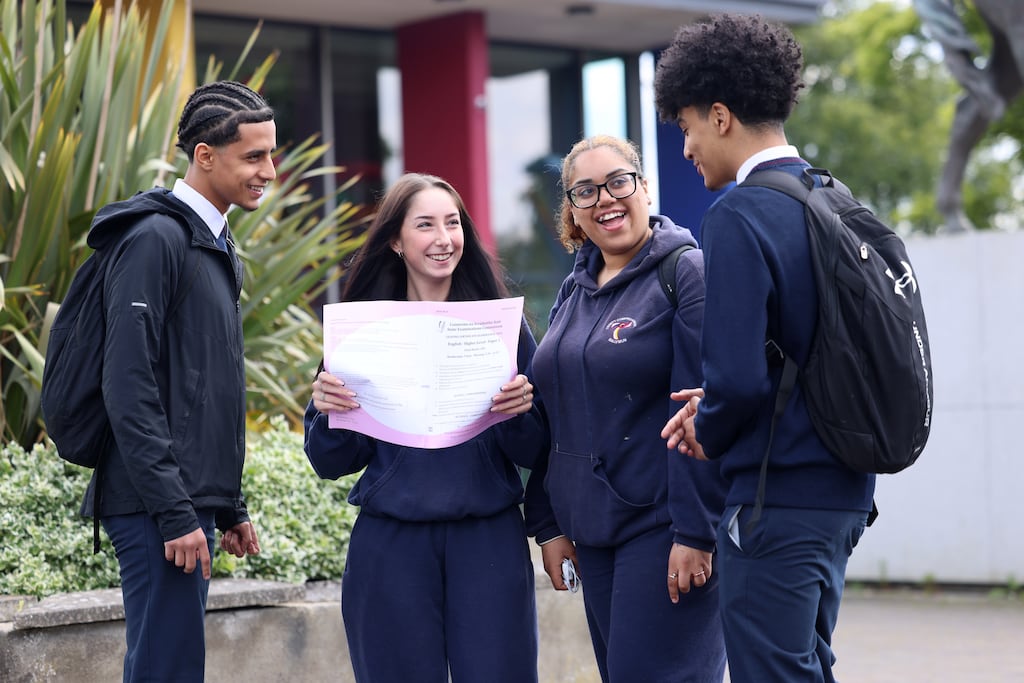Students Aziz Abdulnasser (left) and his twin Rahaman (right) with Sara Pohorski and Ahlam Omar, after English paper one in the Leaving Cert at Trinity Comprehensive School, Ballymun, Dublin. Photograph: Dara Mac Dónaill