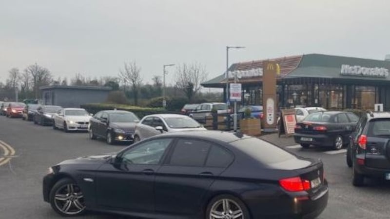 Cars queuing outside McDonald’s drive through in Blanchardstown, Dublin on Monday evening.