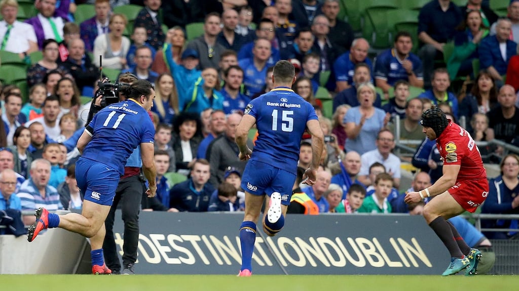 Leinster’s James Lowe on his way to scoring a scry in the Pro14 final. Photograph: Tommy Dickson/Inpho