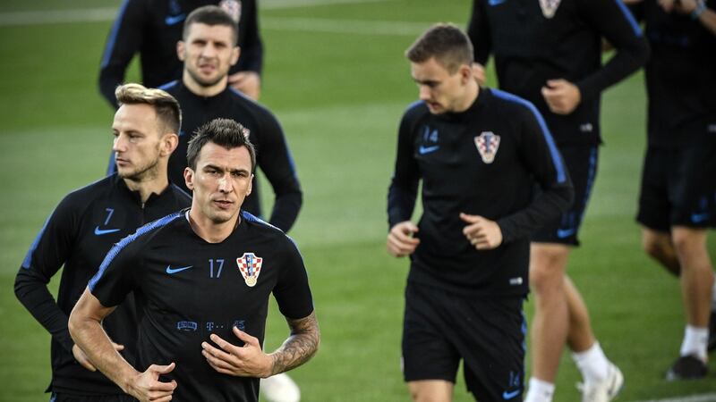 Mario mandzukic (L) is set to lead the line for Croatia against England. Photograph: Alexander Nemenov/AFP/Getty
