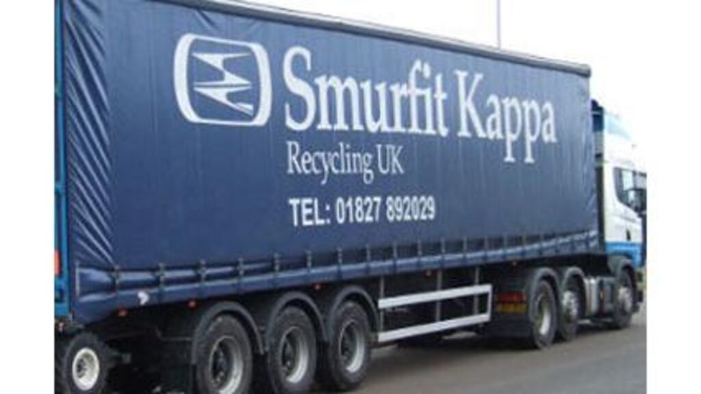 Packaging giant Smurfit Kappa has suffered a reduction in assets following the devaluation of the Venezuelan currency.