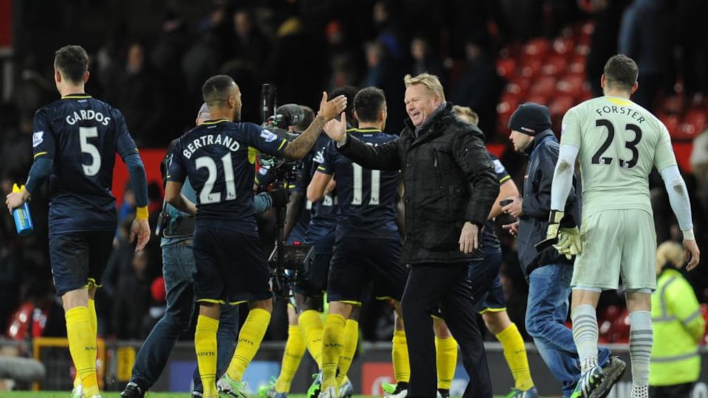 Southampton’s Dutch manager Ronald Koeman congratulates defender Ryan Bertrand after the victory over Manchester United at Old Trafford. Photograph: Oli Scarff/AFP