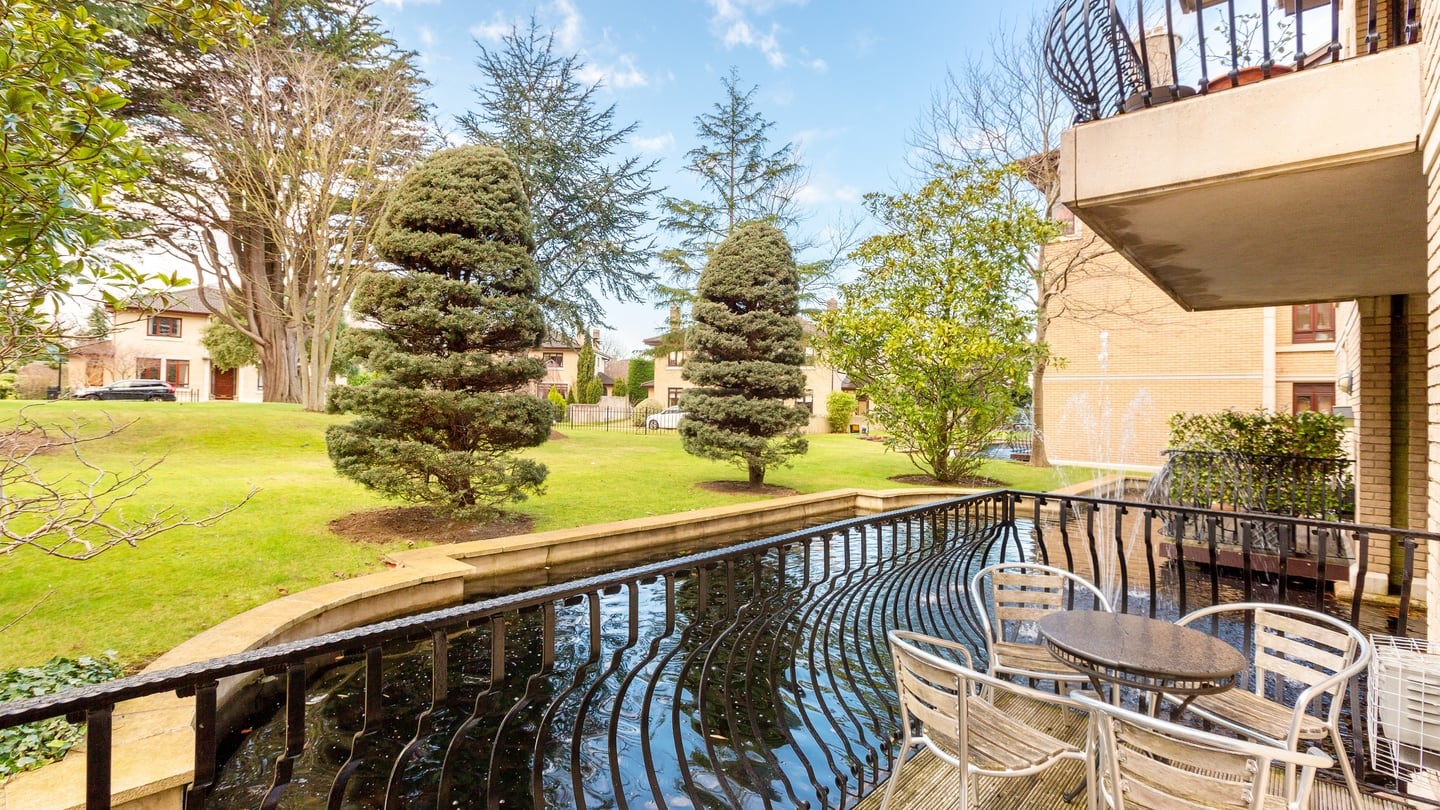 A view-filled French window leads to a 70sq ft balcony over the moat