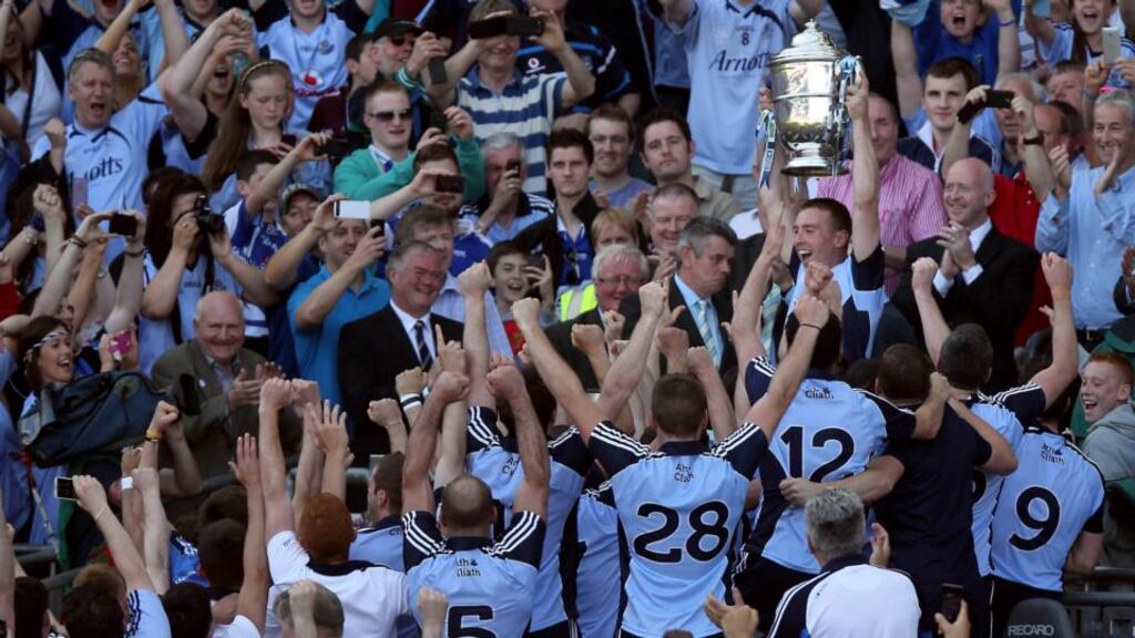 Dublin captain Johnny McCaffrey lifts the Bob O’Keeffe Cup after Leinster final success over Galway at Croke Park. Photograph: Donall Farmer/Inpho.