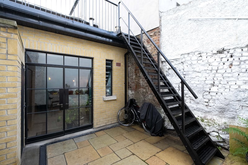 Courtyard and access to roof terrace