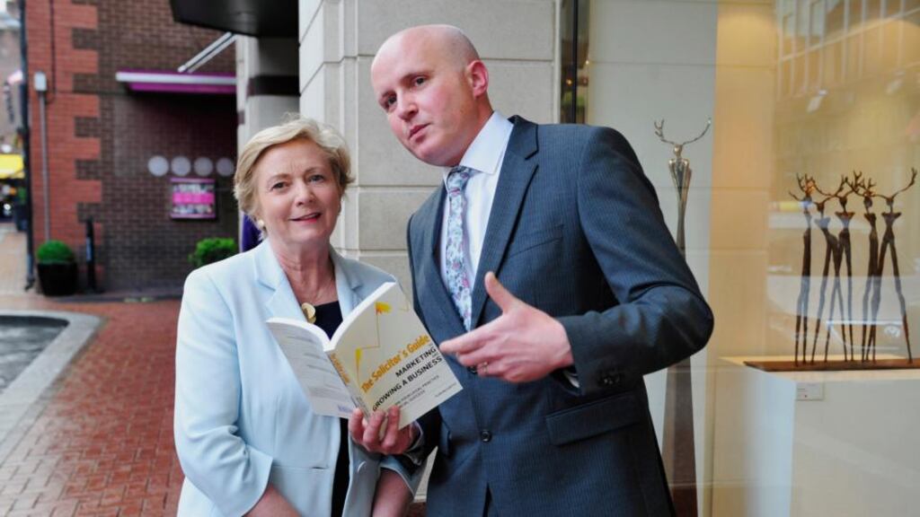 Minister for Justice Frances Fitzgerald (left) pictured with Flor McCarthy at the launch of his book The Solicitor’s Guide to Marketing and Growing a Business. Photograph: Aidan Crawley