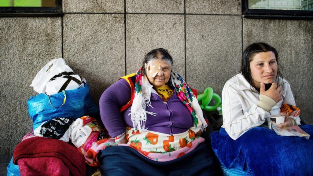 Elena Stanescu and Mariana Ion beg in downtown Stockholm. A growing trend of physical assaults against Roma has challenged Sweden’s reputation as one of Europe’s most tolerant nations – and highlighted the divide between refugees from outside Europe and the Roma, who are free to travel within the EU. Photograph: Moa Karlberg/The New York Times