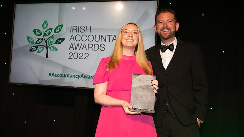 Nicola Peoples, commercial director, Circit, presents the Medium Practice of the Year award to Jimmy Sheehan, Contracting PLUS.