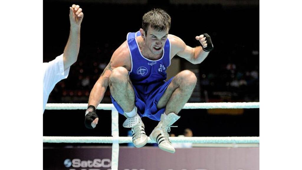John Joe Nevin of Cavan BC leaps for joy after securing a win over Otgondalai Dorjnyambuu of Mongolia on a countback in their 56kg bout at the 2011 AIBA World Boxing Championships, in Baku. The victory secured a quarter-final spot and a place at the London Olympics next year. - (Photograph: Stephen McCarthy/SPORTSFILE)