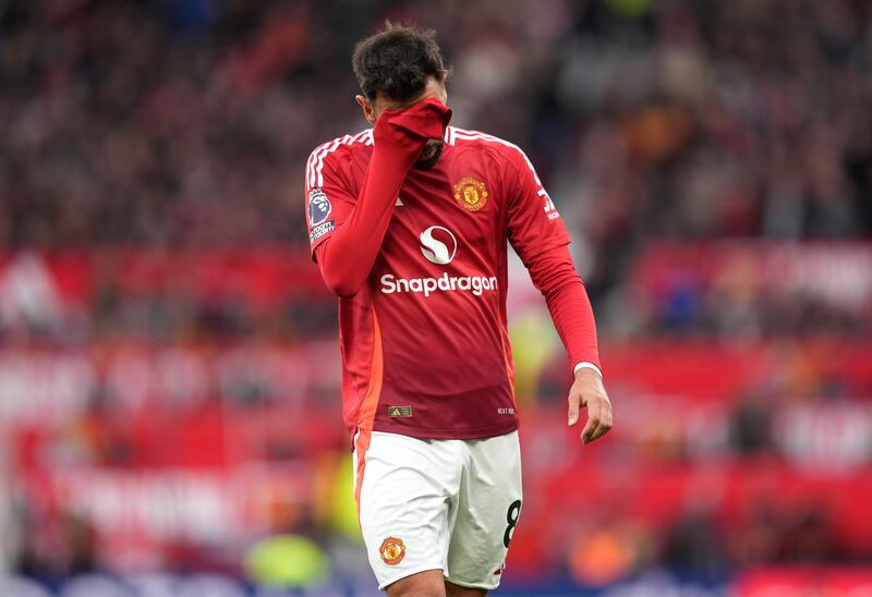 Manchester United's Bruno Fernandes walks after being shown a red card. Photograph: Martin Rickett/PA Wire