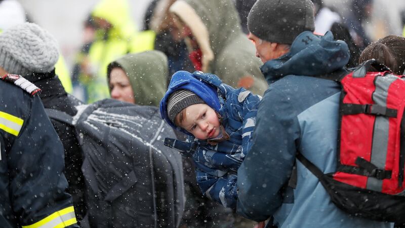 Ukrainian people pass through the border crossing of Siret, northern Romania. Photograph: Robert Ghement/EPA