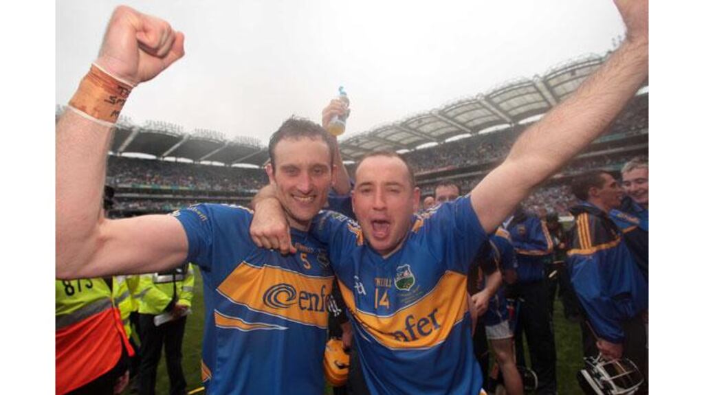 Tipperary vice captain Declan Fanning (L) and captain Eoin Kelly celebrate after winning the All- Ireland Senior Hurling Championship final against Kilkenny at Croke Park in September (Photograph: Morgan Treacy/Inpho)