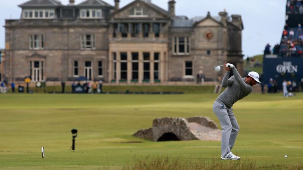 Dustin Johnson tees off the 18th during day one of The Open Championship 2015 at St Andrews. Photo: David Davies/PA