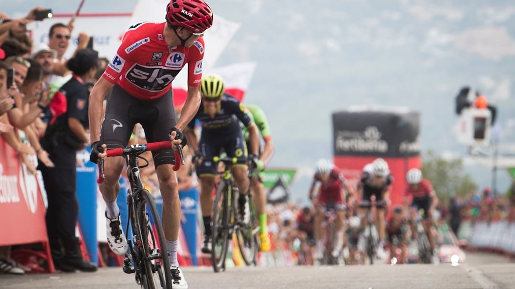 Sky’s Chris Froome looks back as he crosses the finish line to win the 9th stage of the 72nd edition of the Vuelta Tour of Spain cycling race, a 174km route between Orihuela to Benitachell, in Benitachell. Photograph: Getty Images
