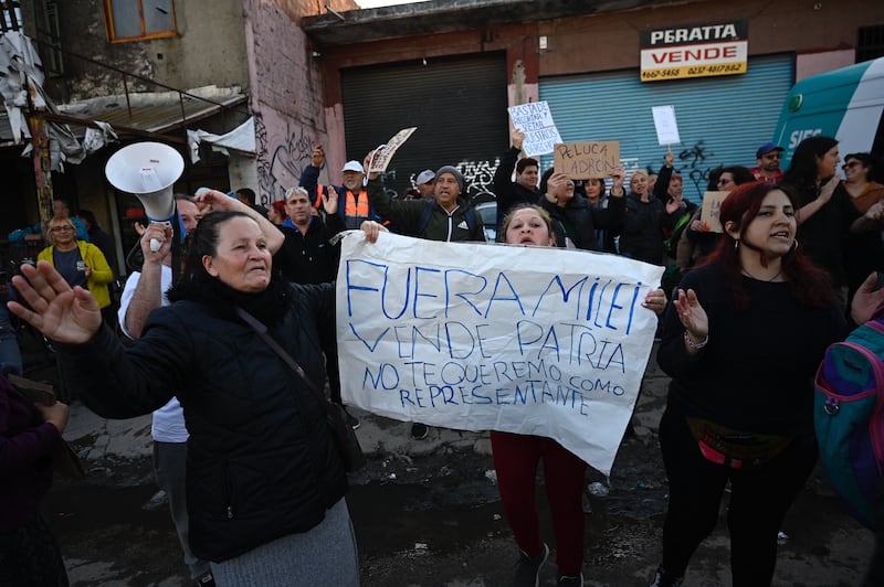 People protest against Argentina's president Javier Milei before he arrives at the closing rally of the La Libertad Avanza political party in Moreno, Buenos Aires province, Argentina, on September 3rd. Photograph: Luis Robayo/AFP/Getty