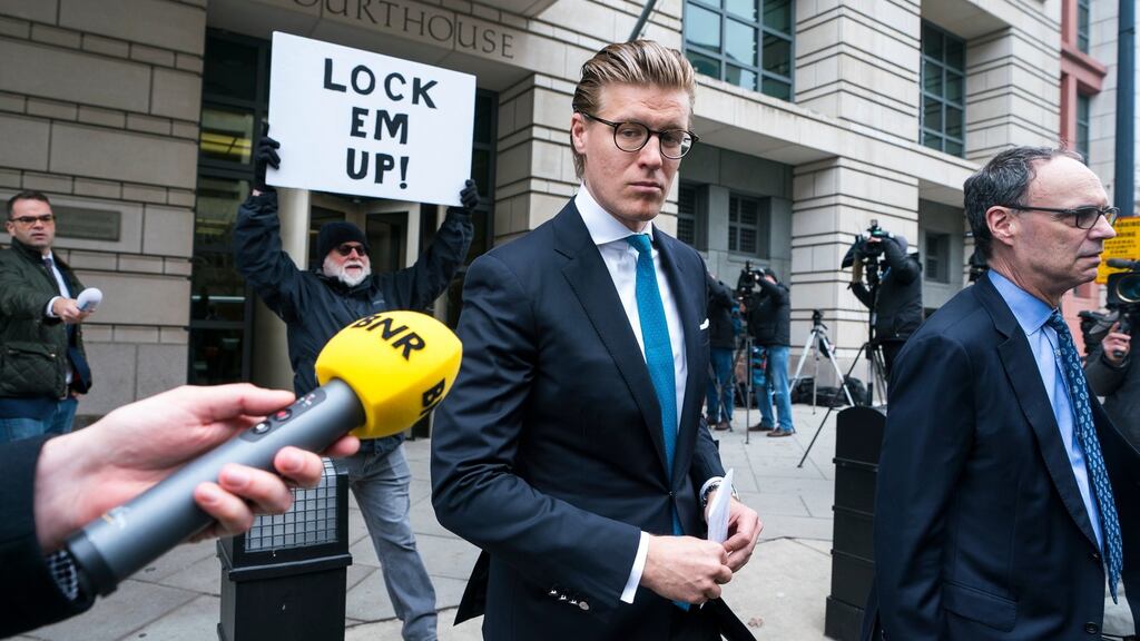 Alex van der Zwaan (C) walks out of a Washington, DC, courthouse after being sentenced to 30 days in prison. Photograph: Jim Lo Scalzo/EPA