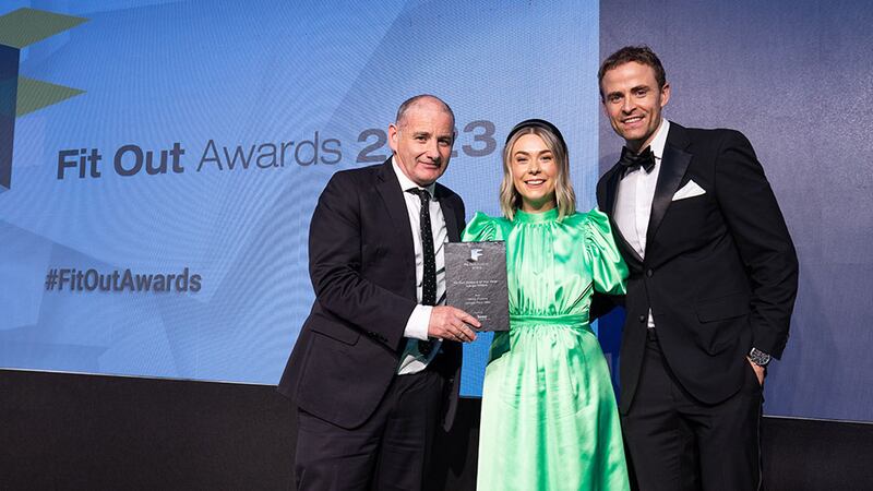 Oscar Kiernan, business development manager at W2W & Bene, presents the fit out project of the year – large office award to Rebecca Wadsworth and Michael Conaghan, Henry J Lyons