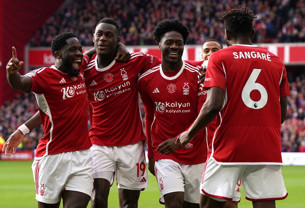 Nottingham Forest's Ola Aina (centre) celebrates scoring his side's first goal of the game against Aston Villa. Photograph: Nick Potts/PA Wire