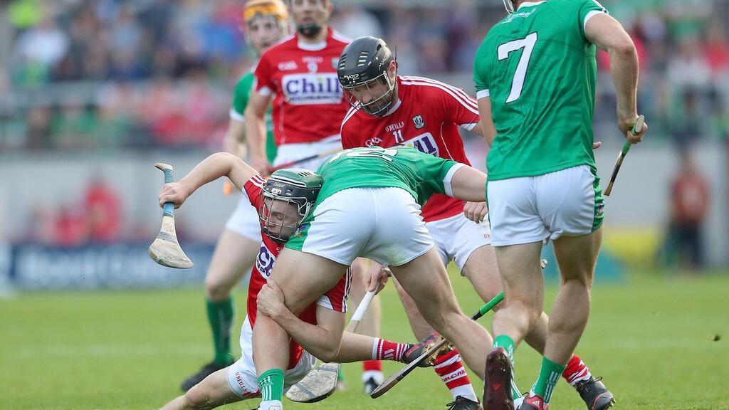 Cork’s Mark Coleman and Tom Morrissey of Limerick battle for possesion during their Munster SHC round-robin clash. Photo: James Crombie/Inpho