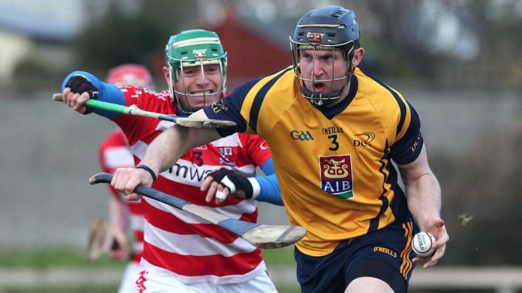 DCU’s Alan Dennehy and John O’Dwyer of CIT in action in the Fitzgibbon Cup at the DCU sports grounds. Photograph: Lorraine O’Sullivan/Inpho