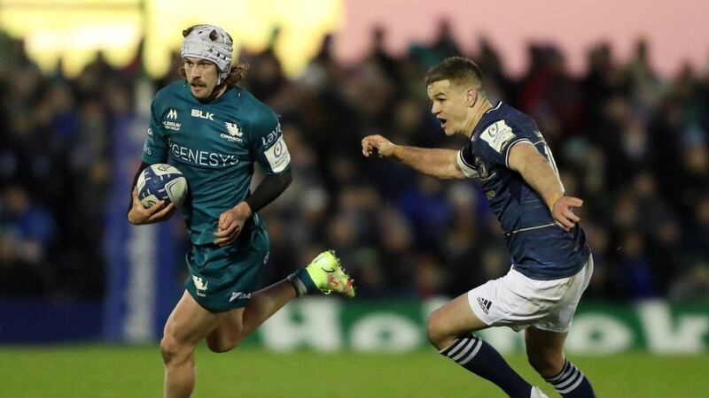 Connacht’s Mack Hansen looks to break past Johnny Sexton of Leinster during the Heineken Champions Cup Round of 16, first-leg match at the Sportsground. Photograph: Oisín Keniry/Getty Images